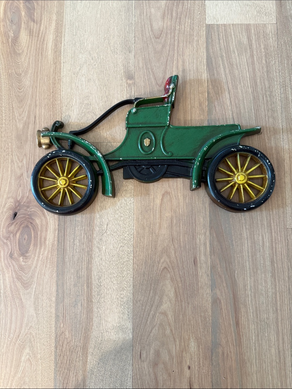 Green Vintage Car Wall Decor with Gold Wheel Accents